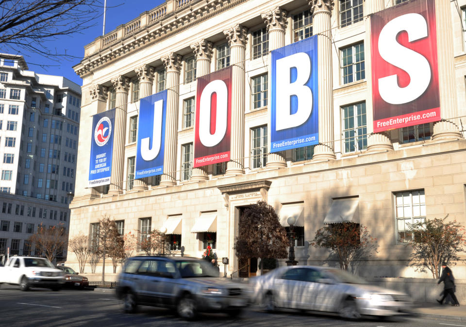 A jobs sign hangs above the entrance to the US Chamber of Commerce building in Washington, DC on December 13, 2011. New claims for US unemployment insurance dropped last week to a level last seen more than three years ago, government data showed December 15, 2011 in a sign of stabilization in the troubled jobs market. Initial jobless claims fell by 19,000 in the week ending December 10 from the prior week, to 366,000, the Labor Department said. AFP PHOTO / Karen BLEIER (Photo credit should read KAREN BLEIER/AFP/Getty Images)