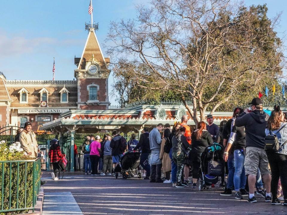 Hundreds of patrons wait in a queue to enter Disneyland Park on January 13, 2020, in Anaheim, California.