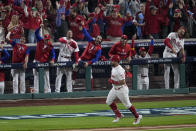 Philadelphia Phillies' Kyle Schwarber rounds the bases after a home run during the first inning in Game 3 of the baseball NL Championship Series between the San Diego Padres and the Philadelphia Phillies on Friday, Oct. 21, 2022, in Philadelphia. (AP Photo/Matt Rourke)