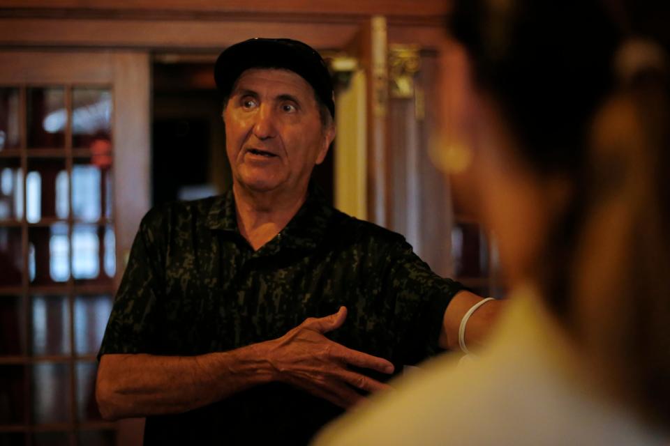 Pete Souza, Dartmouth native and famed Chief Official White House Photographer for President Obama, tours The Zeiterion Performing Arts Center with Executive Director Rosemary Gill and Marketing Director Penny Pimentel