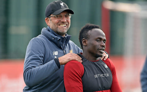 Jurgen Klopp with Sadio Mane on the training field - Credit: GETTY IMAGES