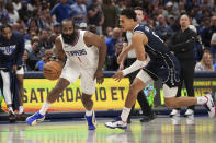 Los Angeles Clippers guard James Harden (1) drives past Dallas Mavericks guard Josh Green, front right, during the first half of Game 4 of an NBA basketball first-round playoff series Sunday, April 28, 2024, in Dallas. (AP Photo/Jeffrey McWhorter)