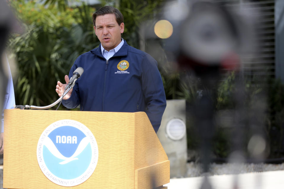 Florida Gov. Ron DeSantis speaks about Tropical Storm Dorian outside of the the National Hurricane Center, Thursday, Aug. 29, 2019, in Miami. (AP Photo/Lynne Sladky)