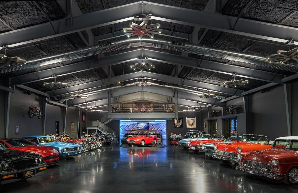 a large room with many cars in it