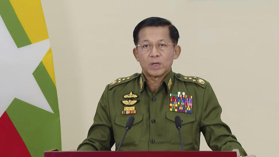 In this image taken from video posted in Tatmadaw True Information Team Facebook page, State Administrative Council Chairman and Commander-in-Chief Senior Gen. Min Aung Hlaing makes a televised statement Thursday, Feb. 11, 2021, in Naypyitaw, Myanmar. The Biden administration says new sanctions against Myanmar will target the country's top military officials who ordered this month’s coup in the Southeast Asian country. The sanctions name top military commander Min Aung Hlaing and his deputy Soe Win, as well as four members of the State Administration Council. (Tatmadaw True Information Team Facebook page via AP)