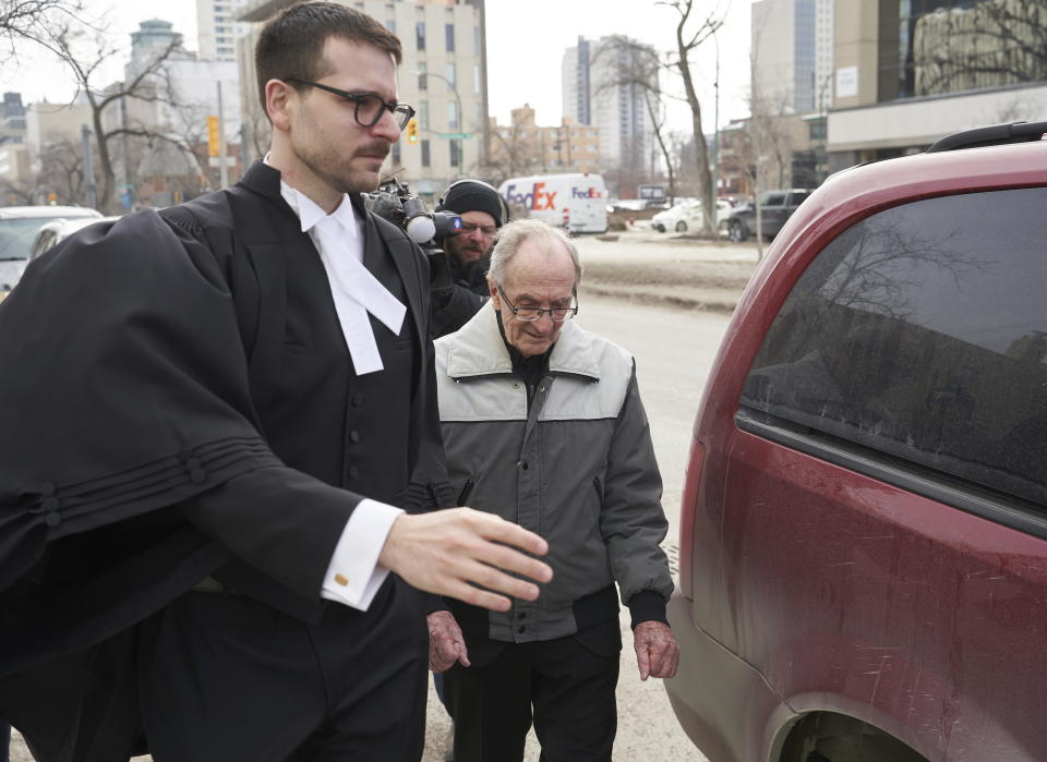 Retired priest Arthur Masse, 93, leaves the Law Courts in Winnipeg, Thursday, March 30, 2023. A Canadian judge has acquitted a now-retired 93-year-old priest of assault after a student at one of Canada’s notorious residential schools accused him of forcing himself on her more than 50 years ago. (David Lipnowski/The Canadian Press via AP)