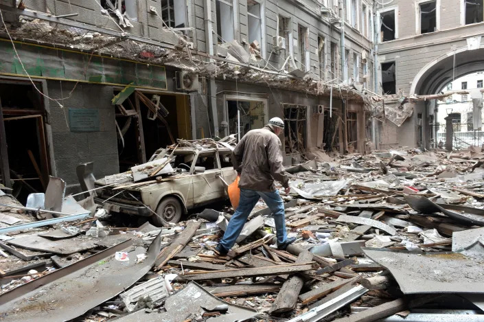 Shelling damaged buildings in Kharkiv, Ukraine&#39;s second-biggest city of Kharkiv, on March 3.  Ukraine and Russia agreed to create humanitarian corridors to evacuate civilians in a second round of talks since Moscow invaded.