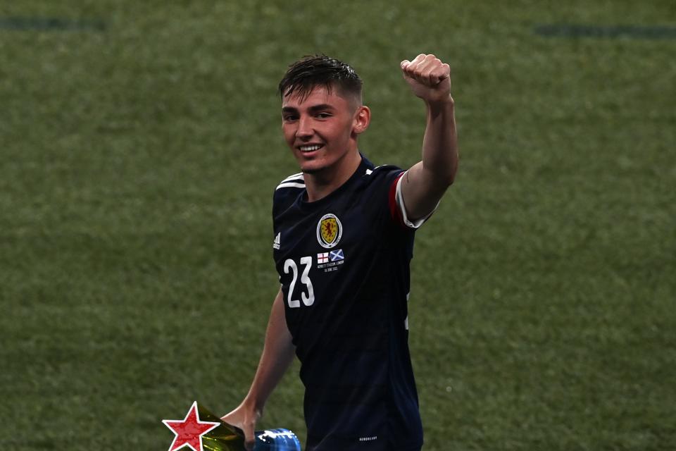 FILE - In this Friday, June 18, 2021 file photo Scotland's Billy Gilmour waves to the fans after the Euro 2020 soccer championship group D match between England and Scotland, at Wembley stadium, in London. Scotland midfielder Billy Gilmour has tested positive for the coronavirus and will have to isolate for 10 days. The Chelsea player will miss Scotland's final Group D match against Croatia on Tuesday and a potential round-of-16 match. (Facundo Arrizabalaga/Pool via AP, File)