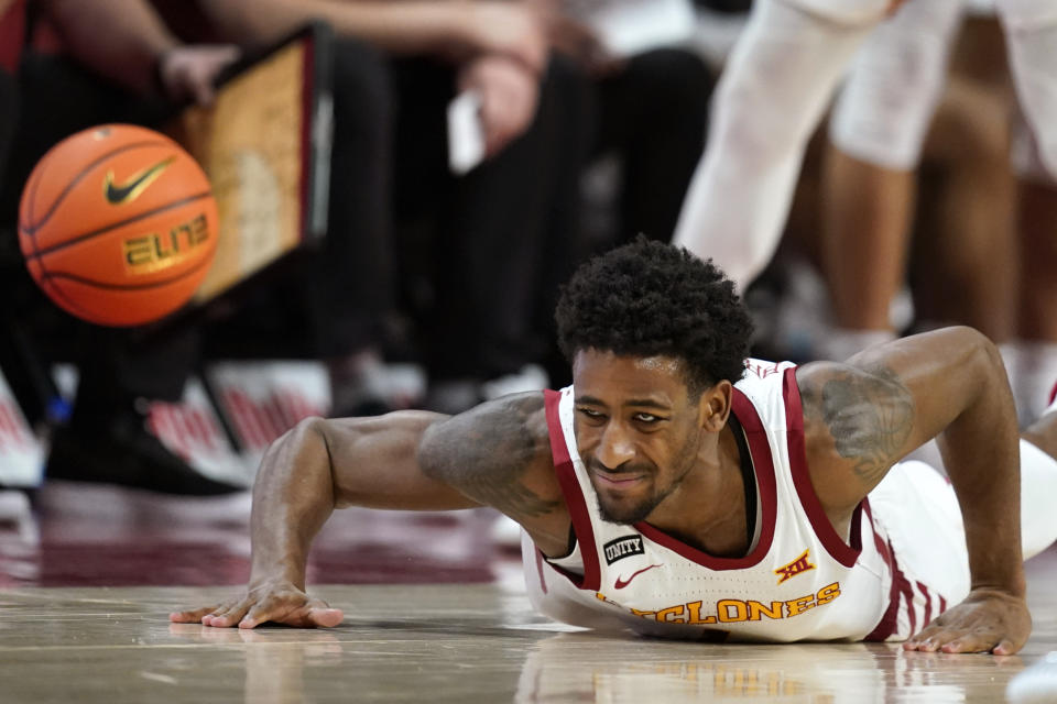 Iowa State guard Izaiah Brockington dives for a loose ball during the second half of an NCAA college basketball game against Texas, Saturday, Jan. 15, 2022, in Ames, Iowa. Iowa State won 79-70. (AP Photo/Charlie Neibergall)