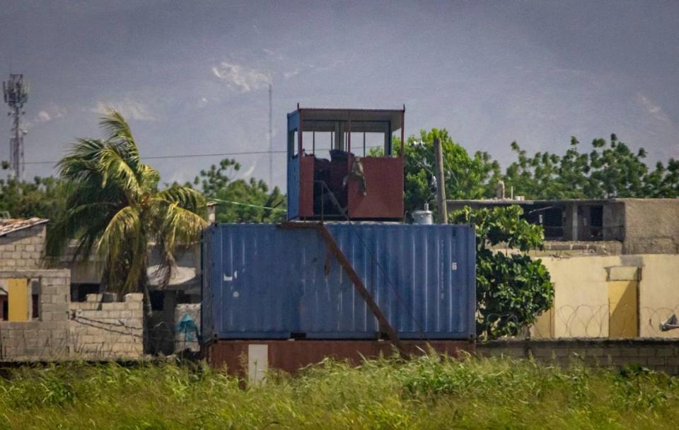 A structure built using shipping containers along the northern perimeter of Toussaint Louverture International Airport in Port-au-Prince, Haiti is now allow Haitian army officers to keep watch over the grounds.