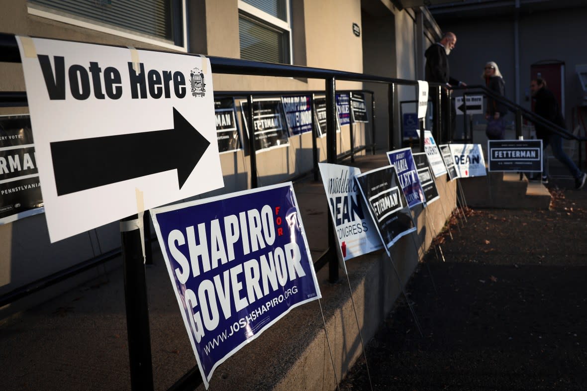 Voters enter the Bryn Athyn Borough Hall polling station to cast their ballots on November 08, 2022 in Huntingdon Valley, Pennsylvania. (Photo by Win McNamee/Getty Images)