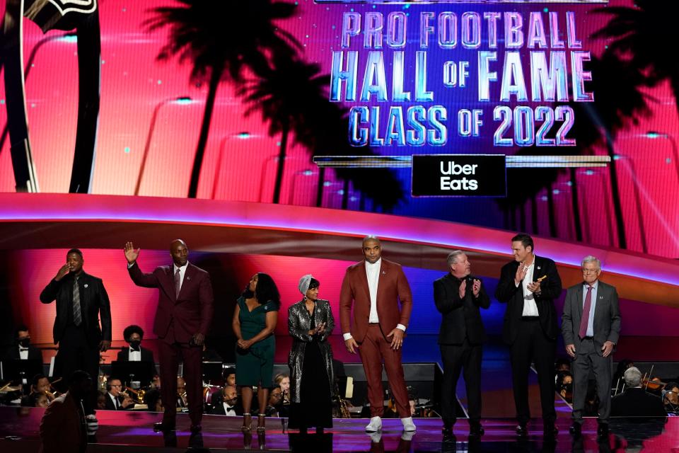 The 2022 NFL Football Hall of Fame class is seen during the NFL Honors show  February. 10, 2022, in Inglewood, Calif. The class is: Tony Boselli, LeRoy Butler, Sam Mills, Richard Seymour, Bryant Young, Cliff Branch, Art McNally and Dick Vermeil. Filling in for Sam Mills is Melanie Mills and filling in for Tony Boselli is Elain Anderson.