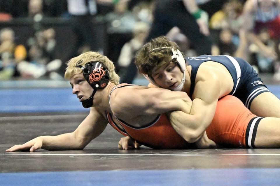 Penn State’s Levi Haines controls Oklahoma State’s Teague Travis in their 157 pound second round match of the NCAA Championships on Thursday, March 21, 2024 at TMobile Center in Kansas City, Mo. Haines routed Travis, 19-4.