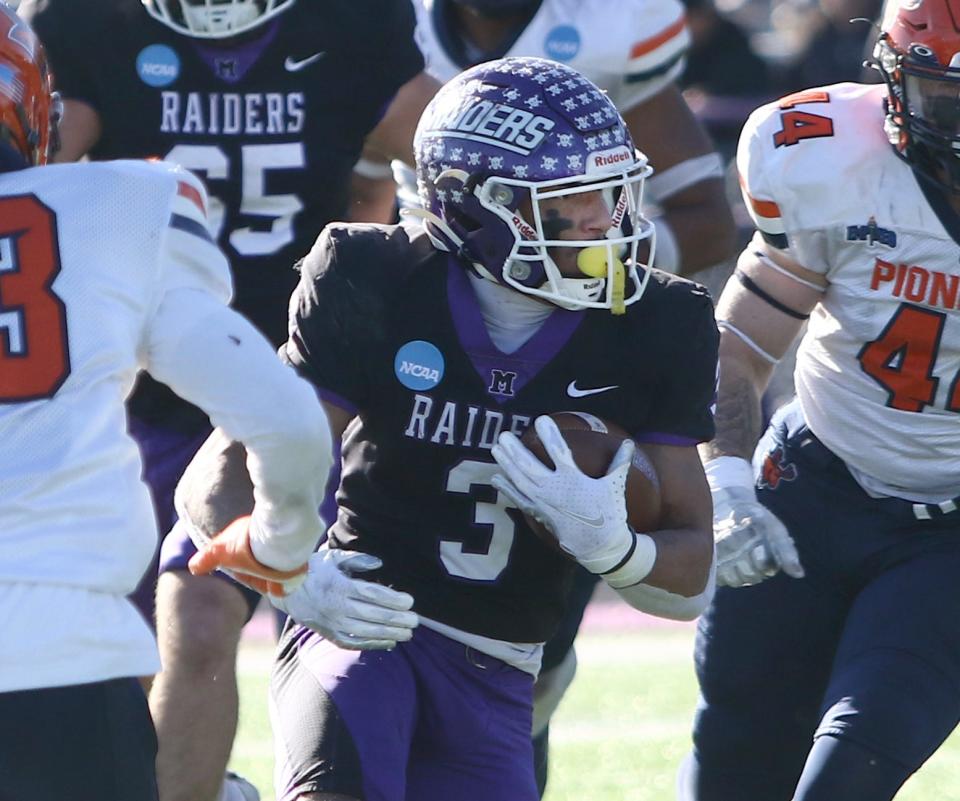 Mount Union running back DeAndre Parker, shown here during a playoff game against Utica last year, rushed for 167 yards and two touchdowns in Saturday's season-opening win over Defiance.