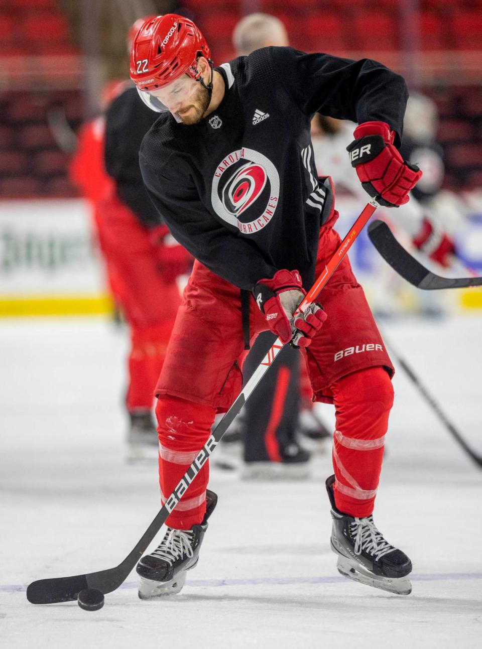 The Carolina Hurricanes Brett Pesce (22) works on his shooting form during their practice on Monday, May 15, 2023 at PNC Arena in Raleigh, N.C. Robert Willett/rwillett@newsobserver.com