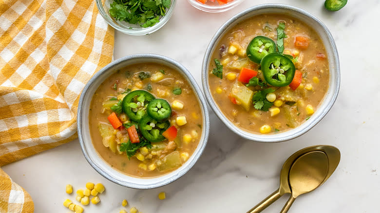 corn chowder garnished with fresh jalapenos