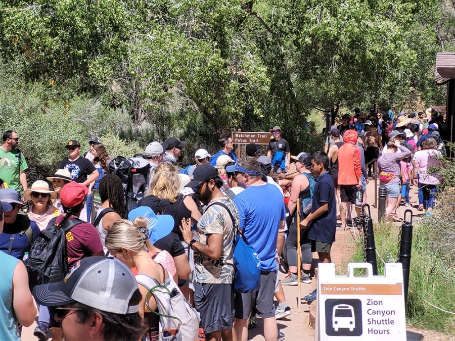 <em>Visitors wait to board shuttles at the Zion Canyon Visitor Center during Labor Day weekend 2023. Credit: NPS/Jonathan Shafer</em>