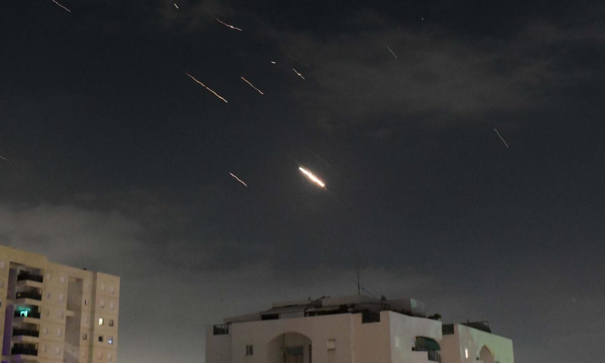 <span>Flares in the sky over Tel Aviv as Israel’s defence system intercepts missiles and drones from Iran. </span><span>Photograph: Xinhua/Rex/Shutterstock</span>