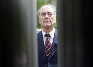 FILE - In this May 8, 2007 file photo, French President Jacques Chirac stands at the General de Gaulle statue during his last Victory Day ceremonies. Jacques Chirac, a two-term French president who was the first leader to acknowledge France's role in the Holocaust and defiantly opposed the U.S. invasion of Iraq in 2003, has died at age 86. (AP Photo/Jacques Brinon; Pool, File)