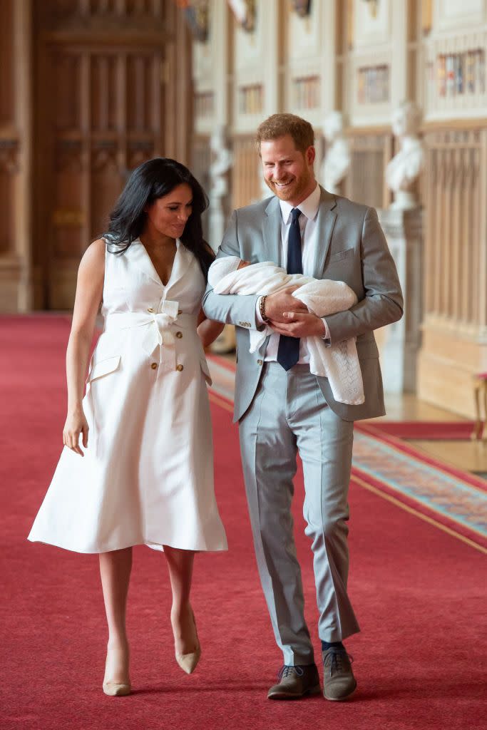 the duke duchess of sussex pose with their newborn son