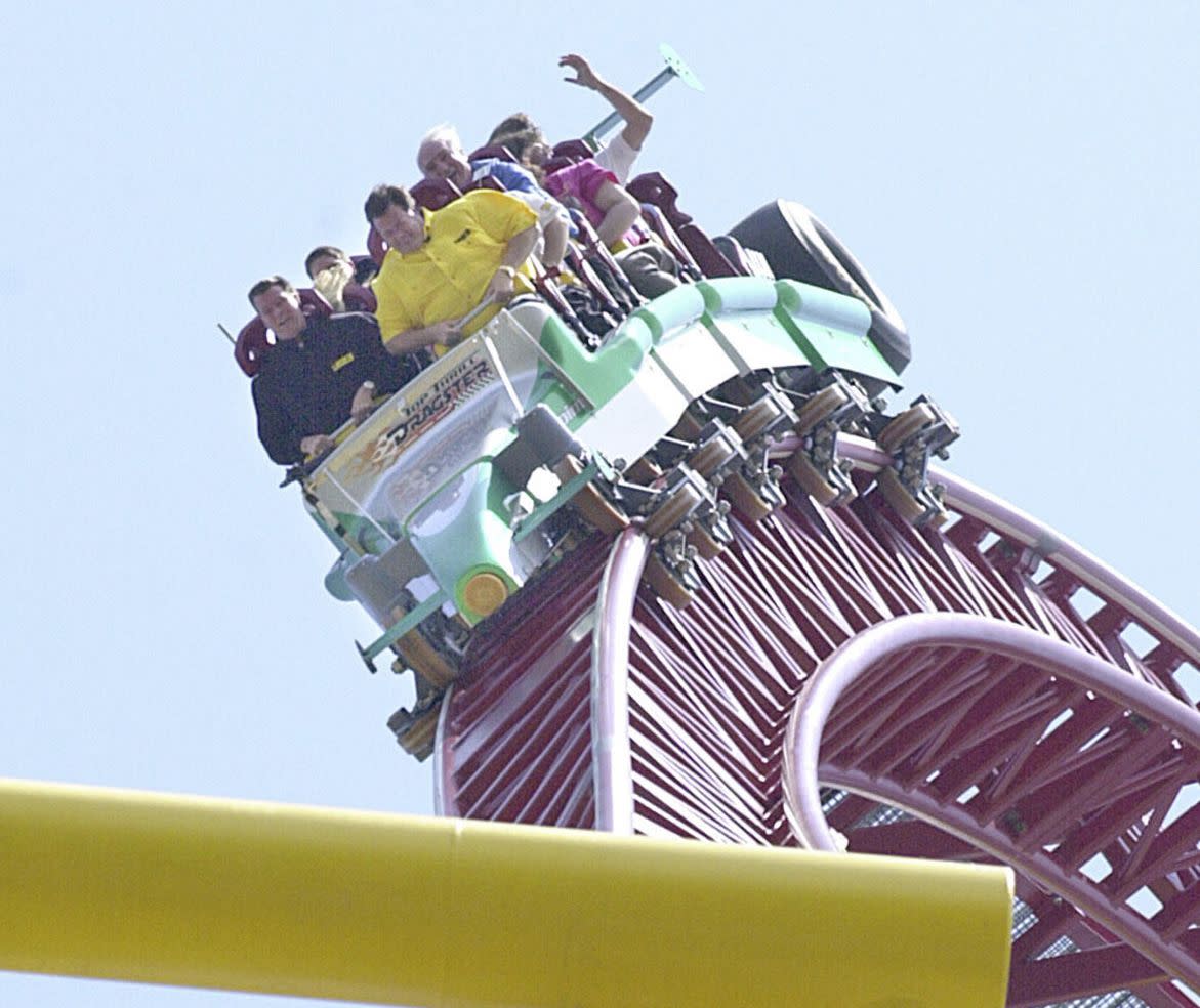 Riders enjoy the Top Thrill Dragster on May 1, 2003.