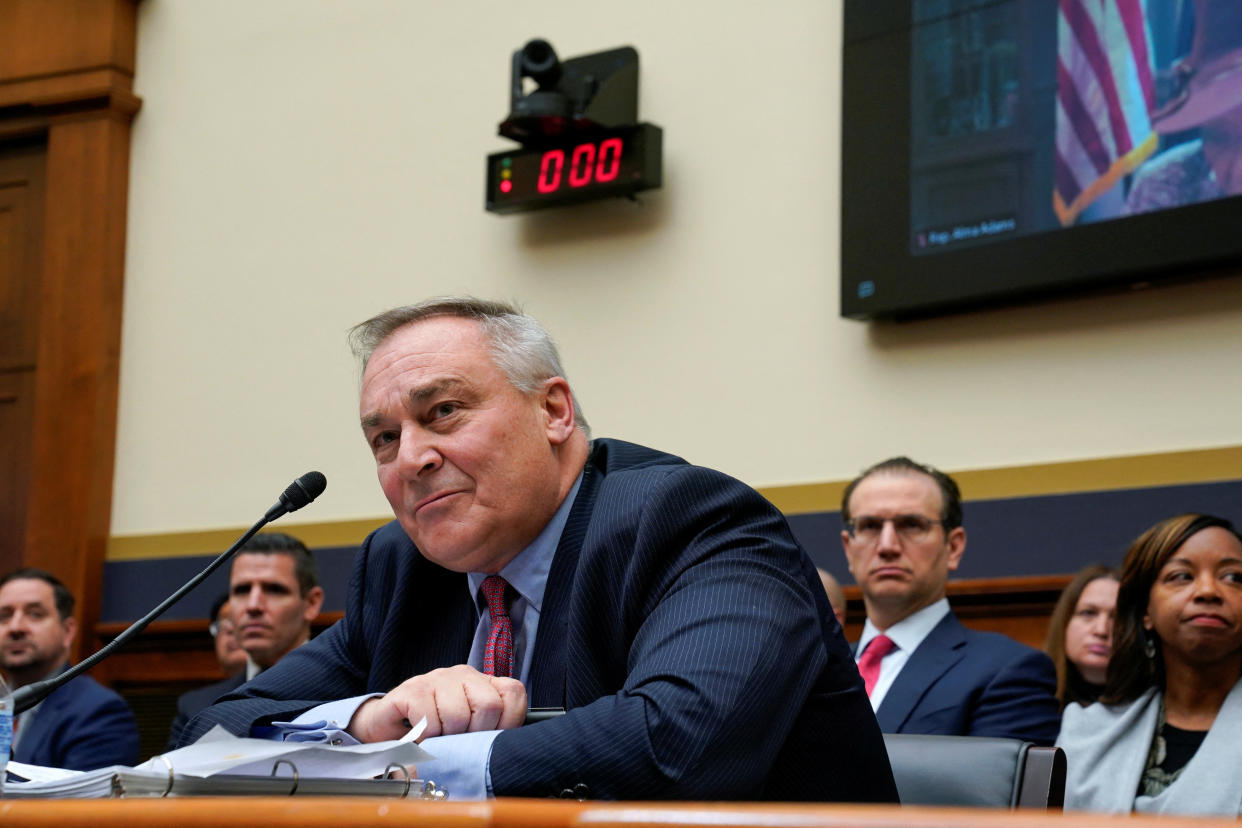 A countdown timer reaches zero, as FTX Group CEO John J. Ray III listens to a question, at a U.S. House Financial Services Committee hearing investigating the collapse of the now-bankrupt crypto exchange FTX after the arrest of FTX founder Sam Bankman-Fried, on Capitol Hill in Washington, U.S. December 13, 2022. REUTERS/Elizabeth Frantz