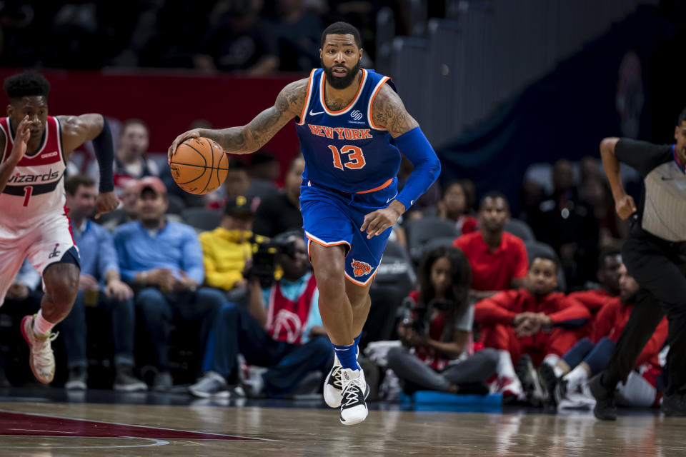 WASHINGTON, DC - OCTOBER 07: Marcus Morris #13 of the New York Knicks dribbles the ball against the Washington Wizards during the first half at Capital One Arena on October 7, 2019 in Washington, DC. NOTE TO USER: User expressly acknowledges and agrees that, by downloading and or using this photograph, User is consenting to the terms and conditions of the Getty Images License Agreement. (Photo by Scott Taetsch/Getty Images)