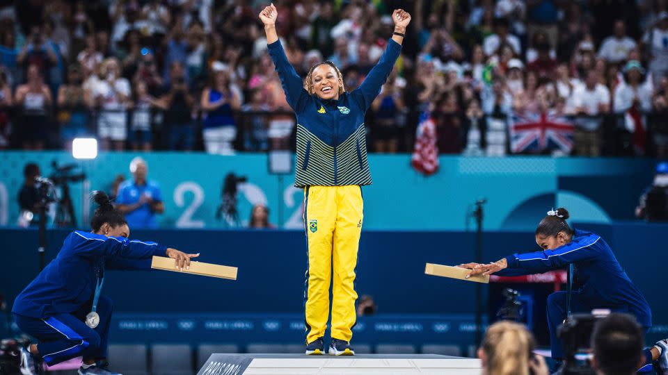 USA's Simone Biles, Brazil's Rebeca Andrade, and USA's Jordan Chiles celebrate during the medal presentation following the Paris Olympics' artistic gymnastics women's floor exercise final. - Luca Castro/Fotoarena/Sipa via AP