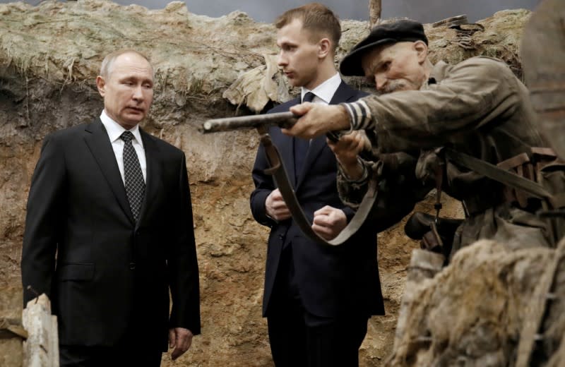 Russian President Vladimir Putin visits a 3D panorama 'Memory speaks. The road through the war' in St.Petersburg