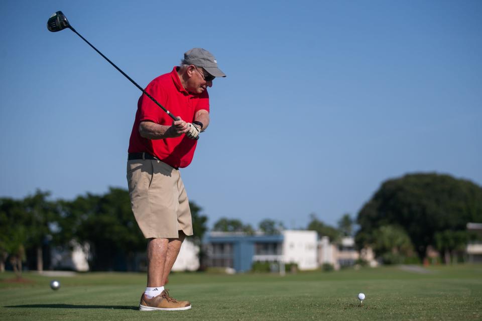 Stanley Schwartz, Delray Beach, prepares to tee off from the 10th tee at King's Point Golf and Country Club on Monday, December 5, 2022, in Delray Beach, FL. Just over two months after a tornado spawned by the eastern bands of September's Hurricane Ian ravaged the 55+ community of King's Point, the community's golf course has re-opened for golfers to once again enjoy.