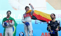 Motor Racing - Formula E - Berlin E-Prix - Flughafen Tempelhof, Berlin, Germany - May 19, 2018 Audi Sport Abt Schaeffler's Daniel Abt celebrates on the podium after winning the race as Audi Sport Abt Schaeffler's Lucas Di Grassi and Techeetah's Jean-Eric Vergne look on REUTERS/Fabian Bimmer