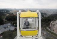 'Amusement Workation' lets teleworkers work from a Ferris wheel and pool side amid the coronavirus disease (COVID-19) outbreak, at Yomiuriland in Tokyo