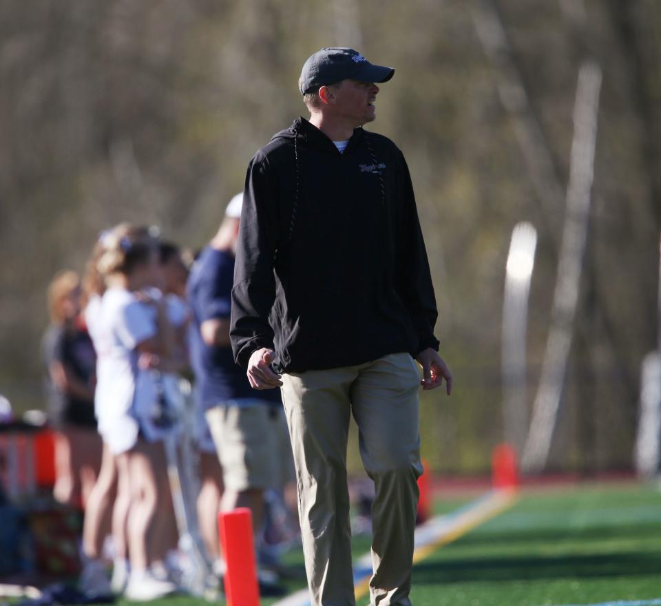 Wappingers girls lacrosse coach Sean Rowan looks on from the sideline during his team's April 25, 2024 game against Tappan Zee.