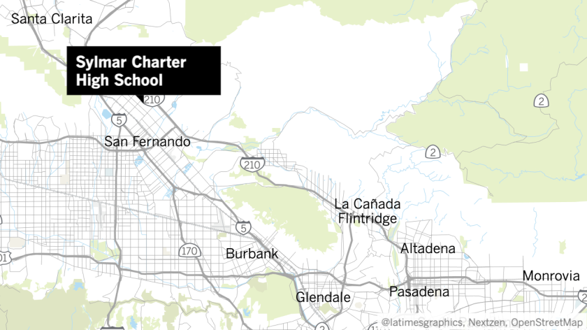 Man with rifle seen Sylmar Charter High School