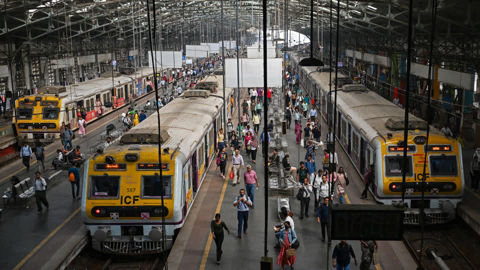 Commuters at Mumbai's Churchgate railway station - Punit Paranjpe/AFP/Getty Images