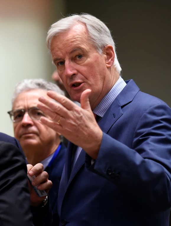 EU Brexit negotiator Michel Barnier said the negotiated text would be presented to EU leaders at a summit on Sunday