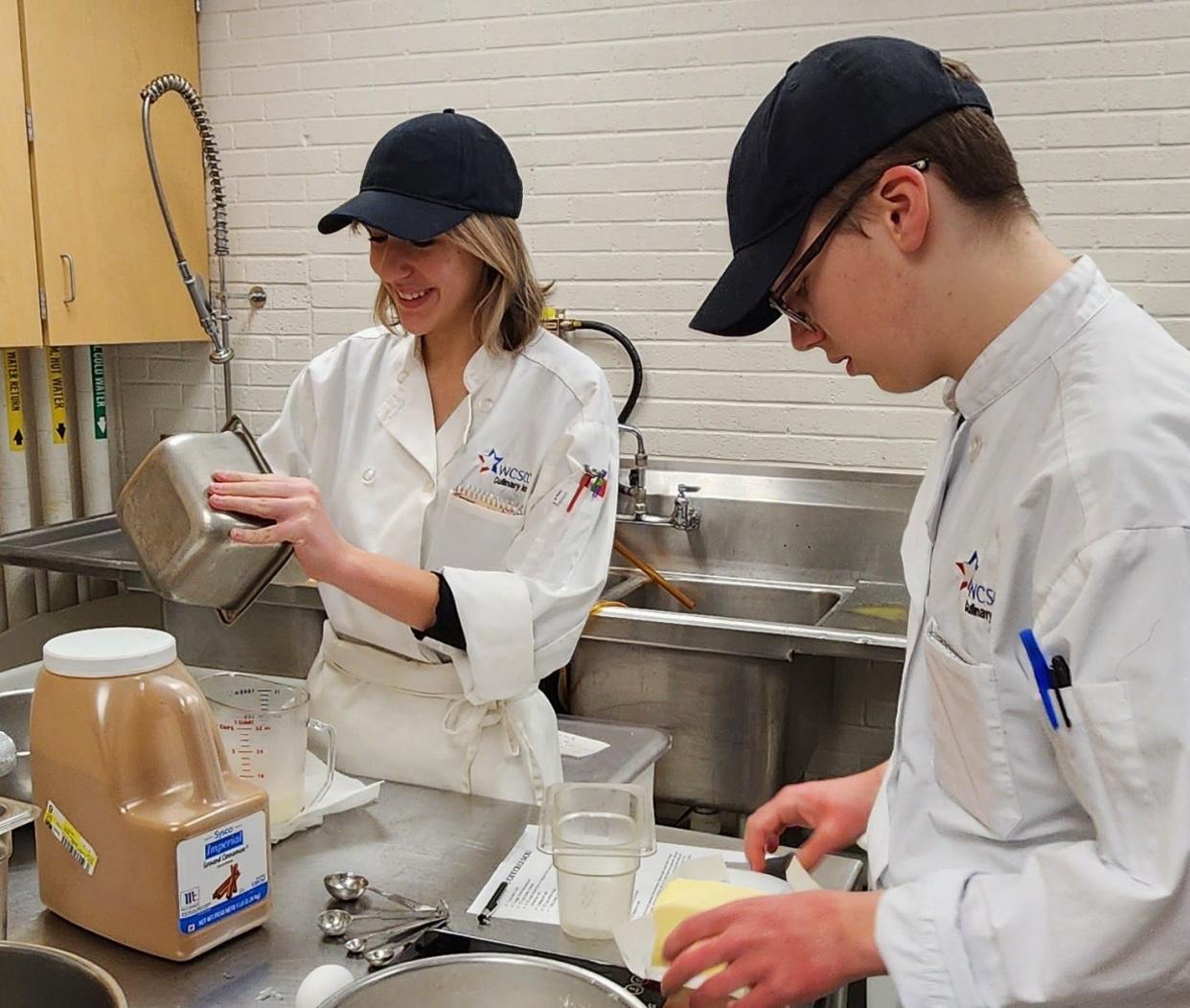 Students in the Culinary Arts Program at the Wayne County Schools Career Center prepare for the opening of the Grass Roots Café. The restaurant is open to the public for a
limited time. Hours of operation and menus can be found at www.wcscc.org.