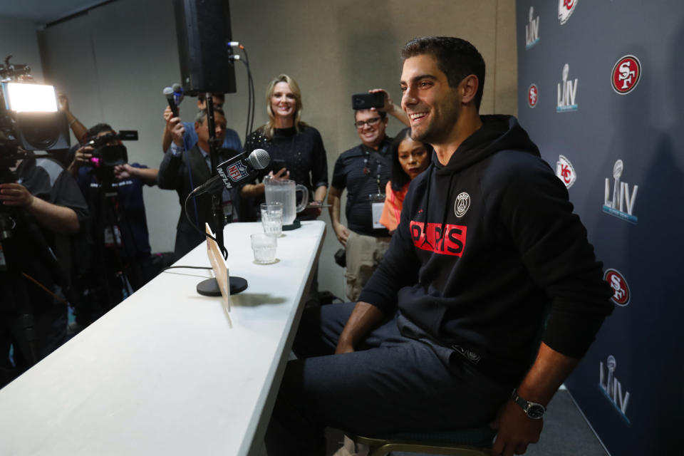 San Francisco 49ers quarterback Jimmy Garoppolo smiles as he speaks during a media availability for the NFL Super Bowl 54 football game, on Tuesday, Jan. 28, 2020, in Miami. (AP Photo/Wilfredo Lee)