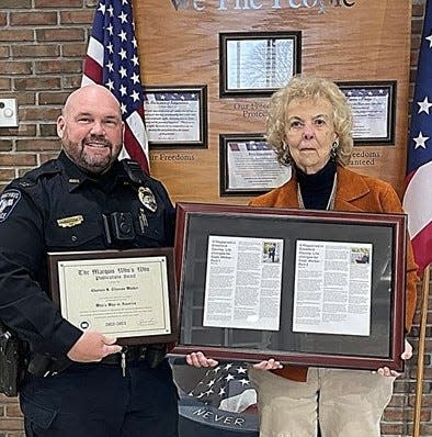 Capt. Tom Walker of the Bucyrus Police Department, left, has been added to the Marquis Who's Who in America. Editors reached out to the officer after he was featured in "It Happened in Crawford County," written by Mary Fox, right.