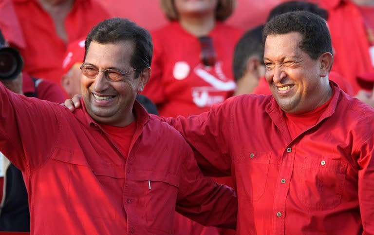 Venezuela's President Hugo Chavez (right) participates in an electoral rally to support his brother Adan -- the governor of the state of Barinas -- on November 15, 2008. The brother of the Venezuelan leader has denied that his sibling is in a coma and insisted that he is responding well to cancer treatment in Cuba