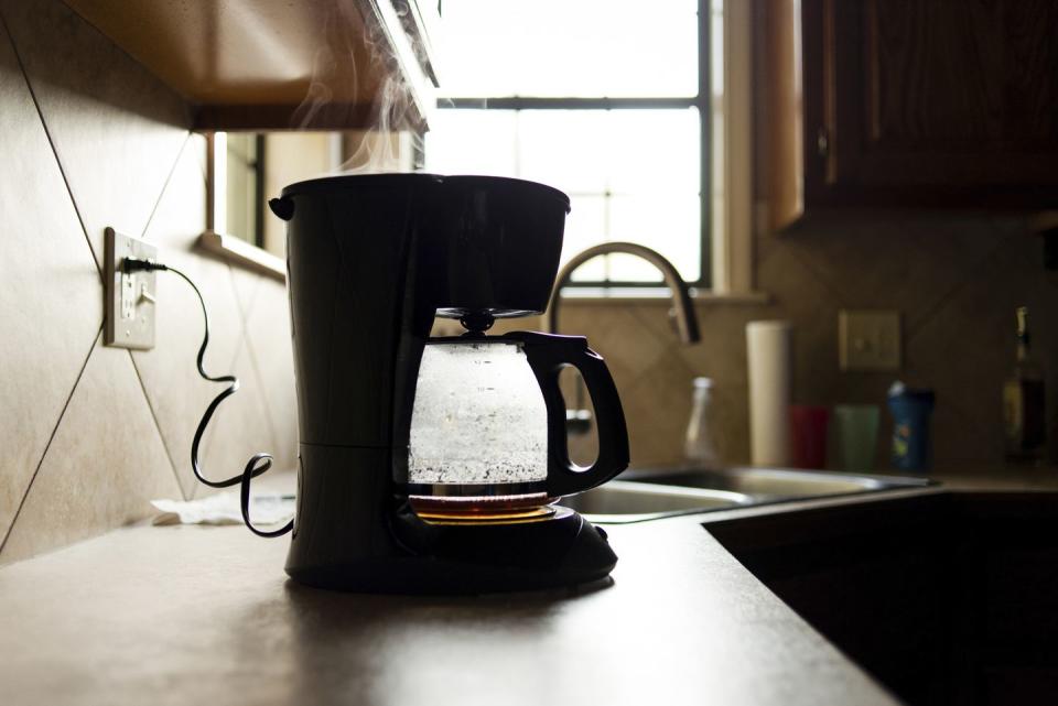 Get a coffee machine that allows you to set a brewing time.