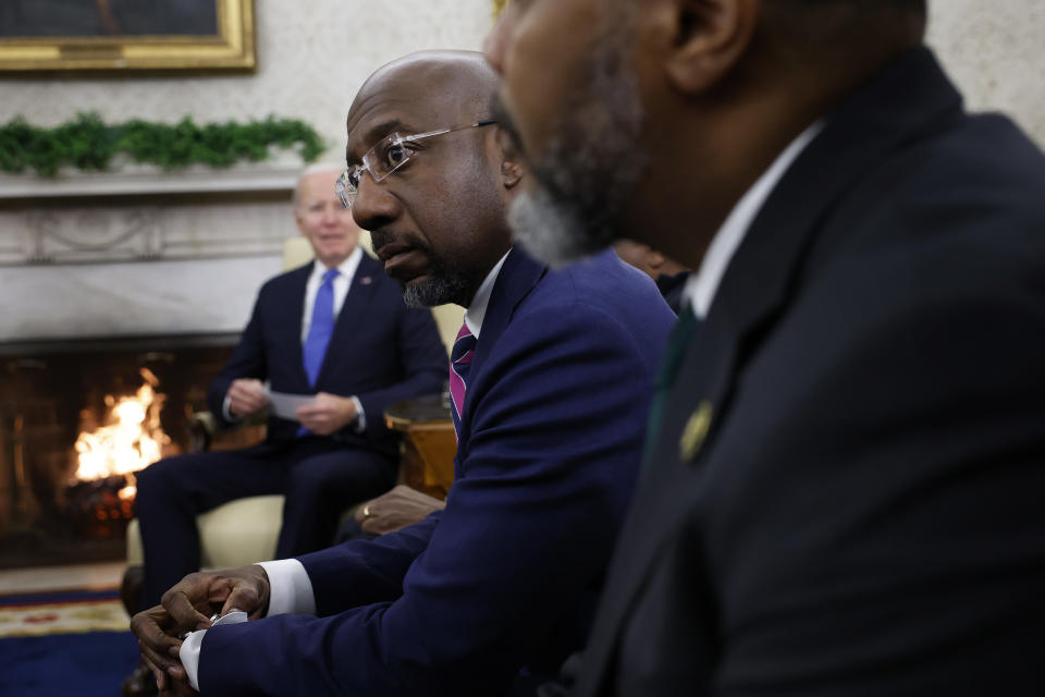 WASHINGTON, DC - FEBRUARY 02: Sen. Raphael Warnock (D-GA) (C) and fellow members of the Congressional Black Caucus meet with U.S. President Joe Biden in the Oval Office at the White House on February 02, 2023 in Washington, DC. Members of the caucus encouraged the administration to push for national law enforcement reform in the wake of several high-profile killings of unarmed Black men, most recently the beating death of Tyre Nichols by Memphis police officers. (Photo by Chip Somodevilla/Getty Images)