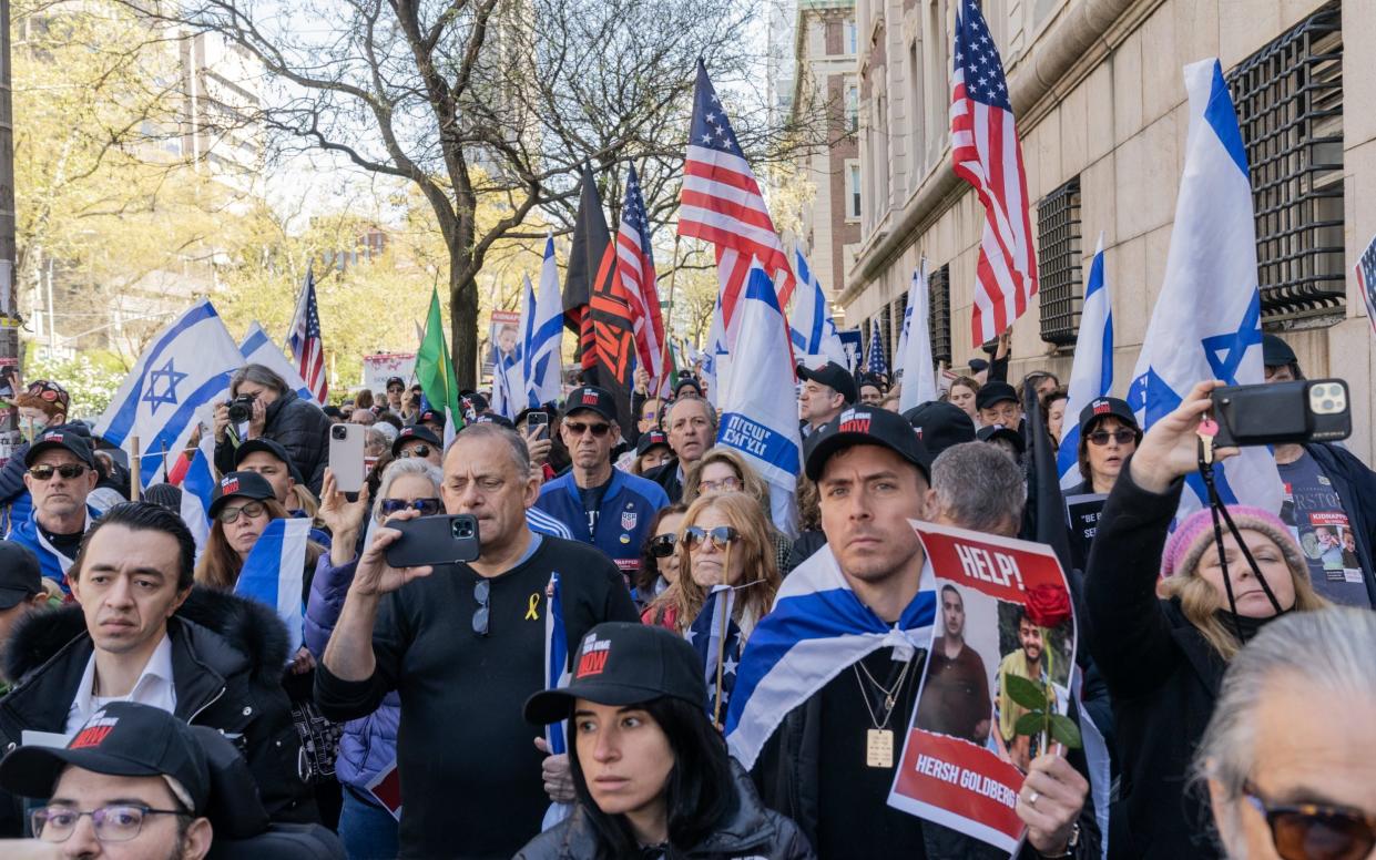 People participate in the ''Bring Them Home Now'' rally outside Columbia University in New York