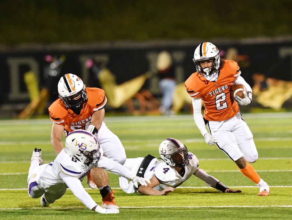 Beaver Falls' Trey Singleton escapes Western Beaver's defense during Friday night's game at Reeves Field in Beaver Falls.