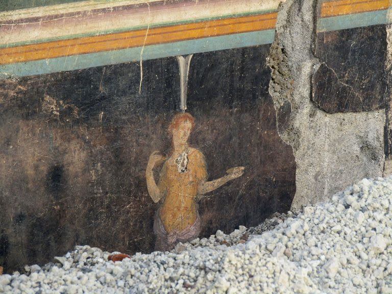 Uno de los frescos inspirados en la guerra de Troya que adornan una sala de banquetes y que fueron descubiertos en Pompeya. (Handout / Parco Archeologico di Pompei press office / AFP)