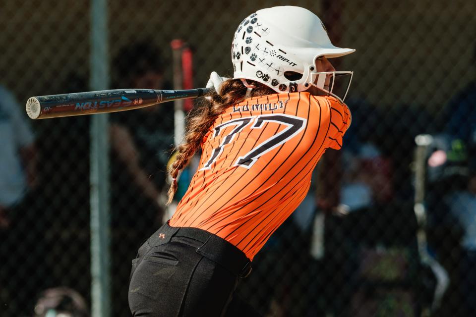 Strasburg's Rylee Becker executes a slap-bunt during a game against Buckeye Trail, Tuesday, April 30 at Strasburg-Franklin Park, in Strasburg.