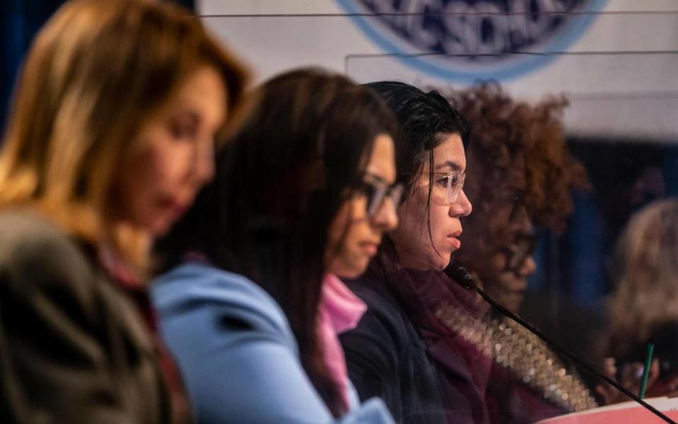 Miami-Dade Public Schools board member Dr. Lubby Navarro, center-right, asks a question during a special meeting held at the school board’s headquarters in downtown Miami, Florida on Monday, January 24, 2022.