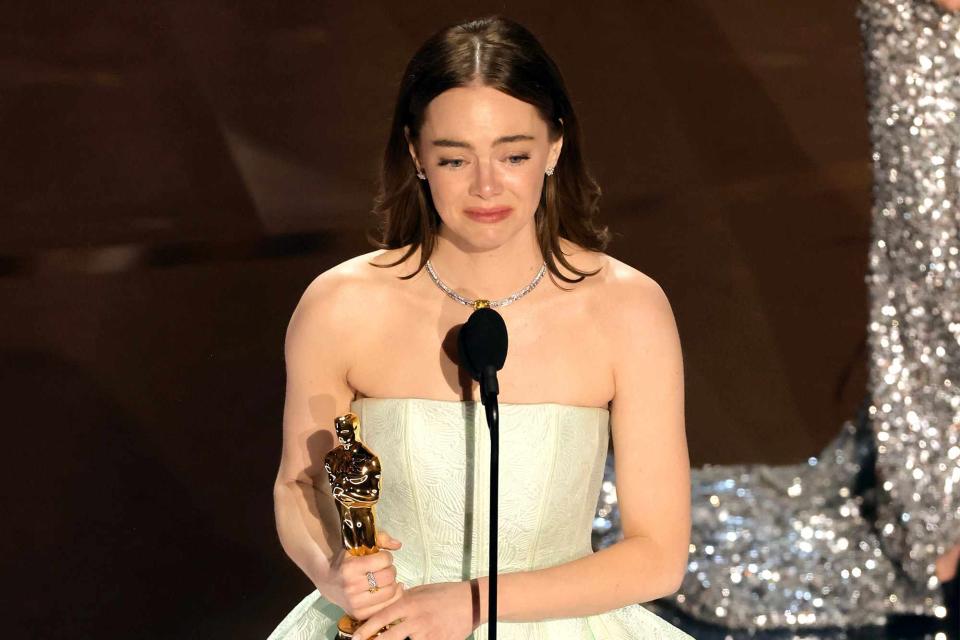 <p>Kevin Winter/Getty Images</p> Emma Stone wins Best Actress for "Poor Things"