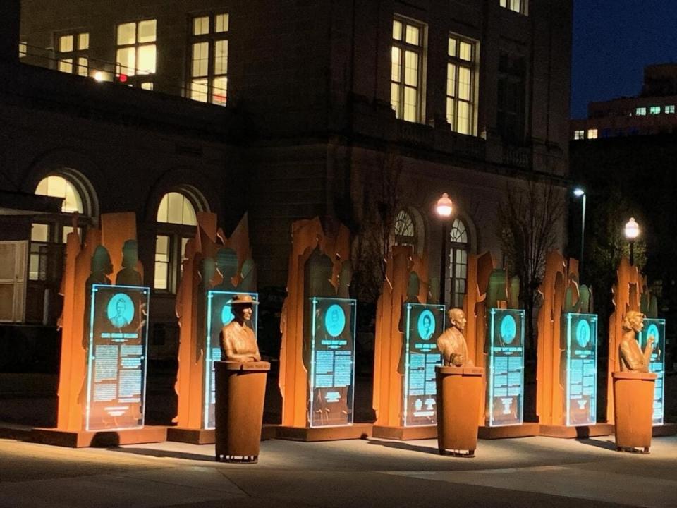 The Memphis Suffrage Monument, "Equality Trailblazers," is seen at night view at the University of Memphis law school. From left, the busts depict Charl Ormond Williams, Rep. Joe Hanover and Rep. Lois DeBerry, all sculpted by Alan LeQuire.