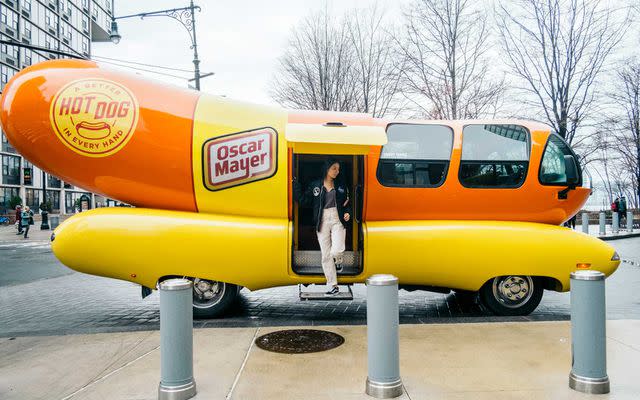 <p>Mariah Tyler / Travel + Leisure</p> Pictured here is the current fleet of Wienermobile vehicles touring the country.